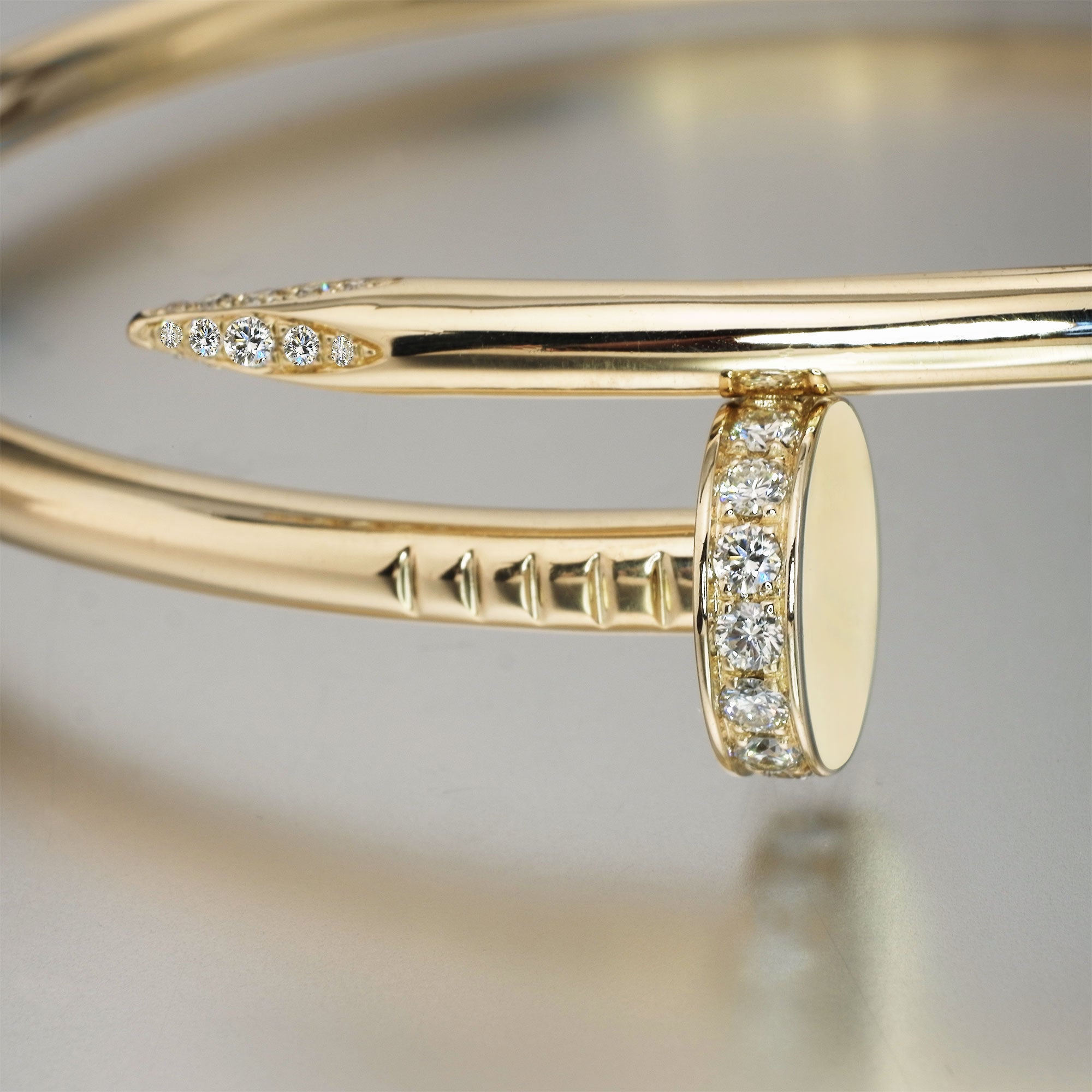 14K GOLD TWISTED NAIL DIAMOND BRACELET