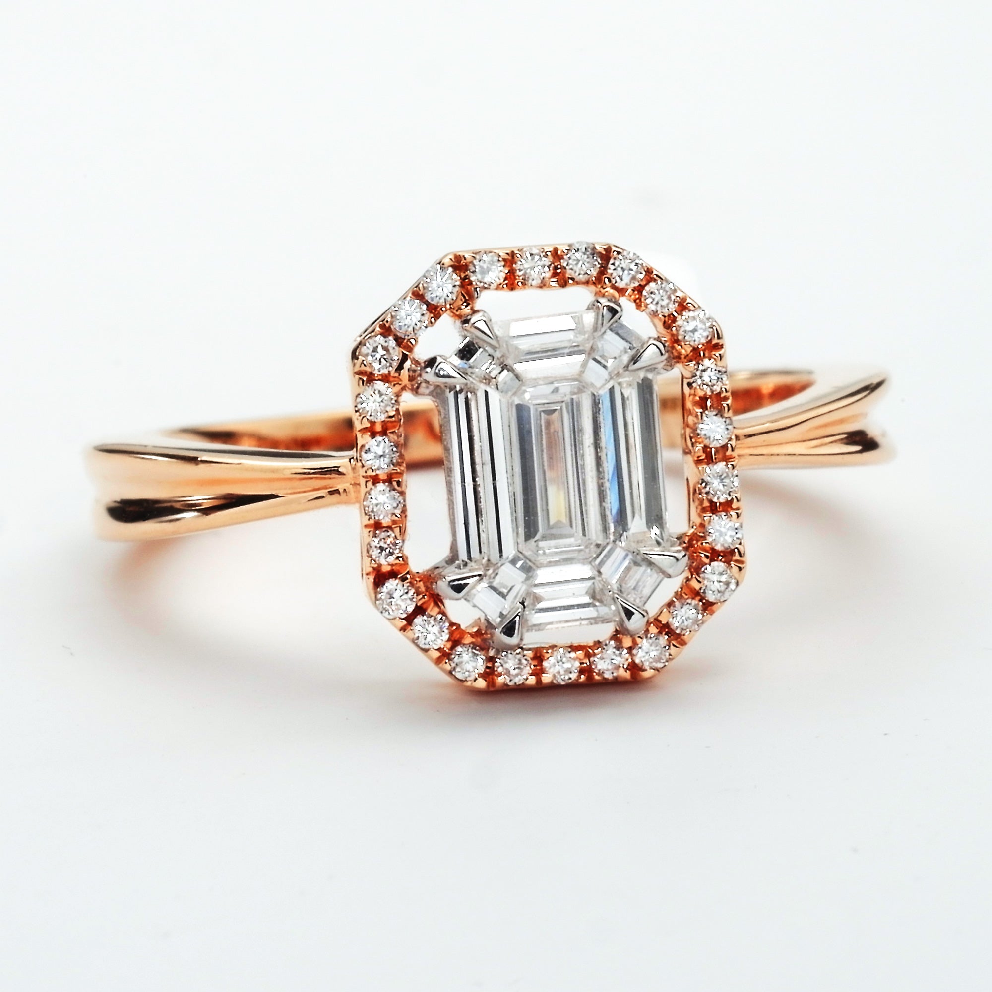 Emerald cut rose gold ring